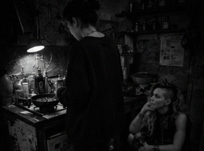 victoria cooking, kira watching from the floor